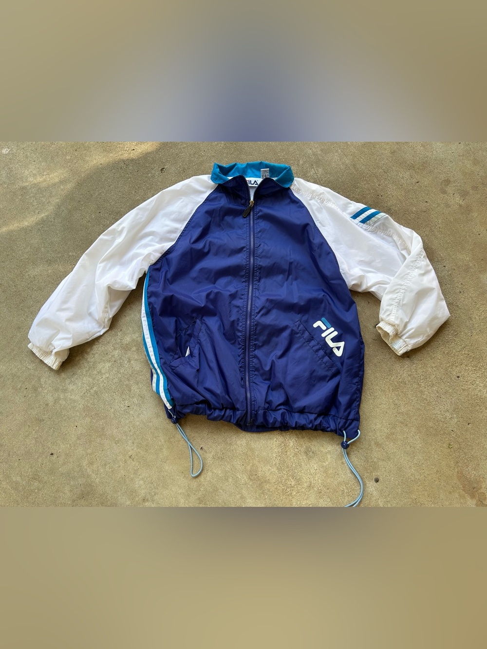 Vintage Fila unisex Blue, White and Teal Windbreaker jacket